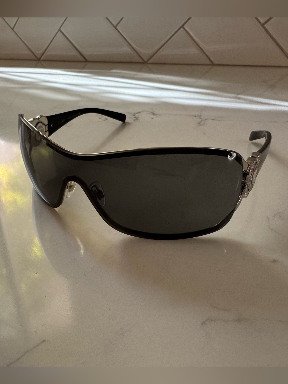 CHANEL Black Shield Sunglasses with Dark Gray Lens and Silver Accents